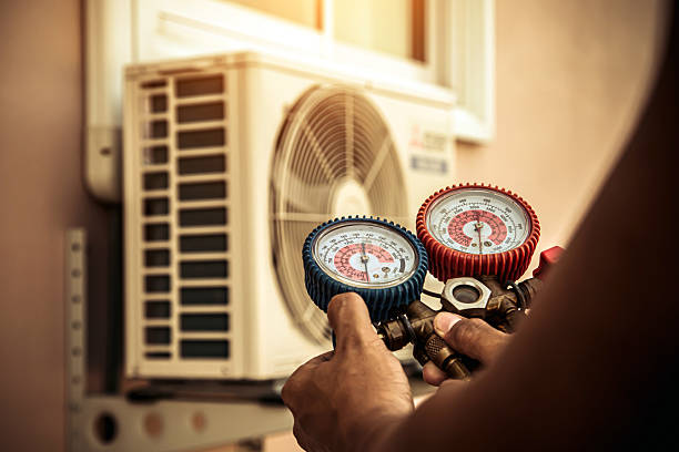 Professional Ac Installation technician working in Marshall, IL
